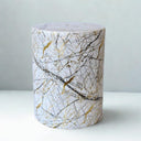 Modern white ceramic stool with gold and black splatter pattern