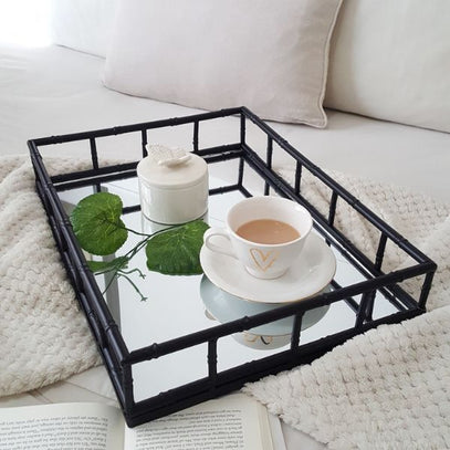 Trays in stylish, functional designs for serving and decor.