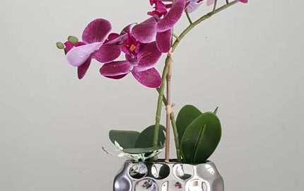 Purple Faux orchid in Silver Pot