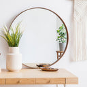 A brightened and balanced living space using strategic mirror placement ideas to maximize natural light and depth. 