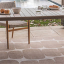 Durable, weather-resistant indoor-outdoor rugs in neutral tones by Woodka Interiors