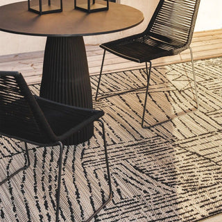 Large area rugs for living, dining, and bedrooms at Woodka Interiors