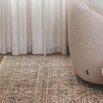 Selection of area rugs and runners in neutral and bold patterns for interior styling