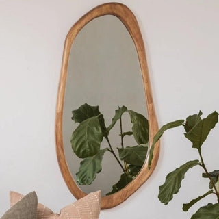 Decorative wall mirrors for home decor available at Woodka Interiors