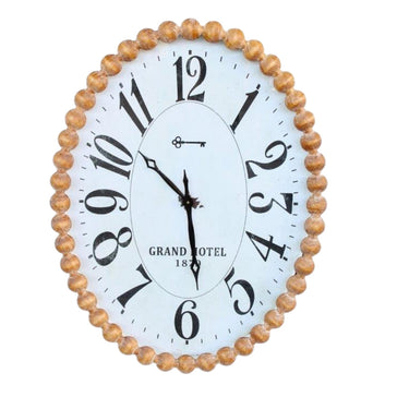 Stylish Large Oval Clock with a natural wood bubble frame and unique oval shape.