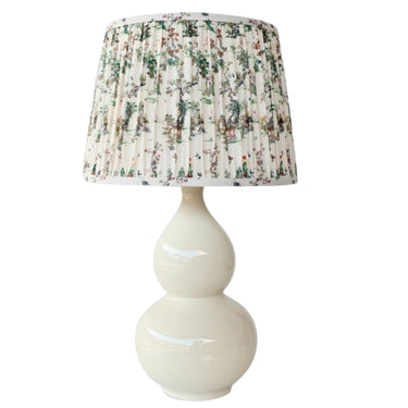 Cream ceramic double gourd table lamp with a pleated Chinoiserie toile de Jouy fabric shade