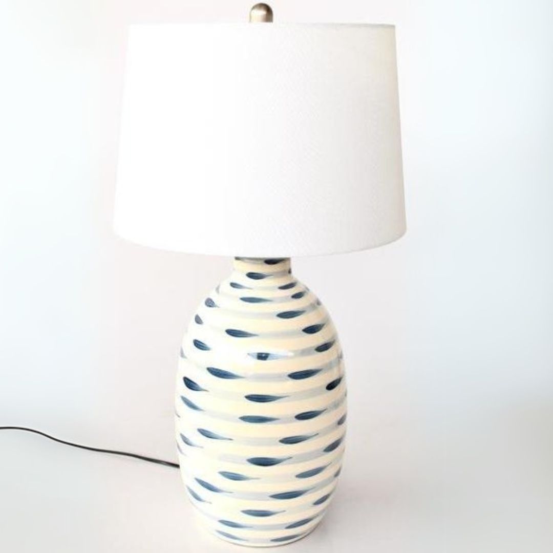 Aquilene Table Lamp with blue strokes for bedroom decor.