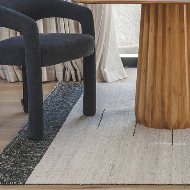 Atrium 100% recycled PET polyester outdoor rug in dining room.