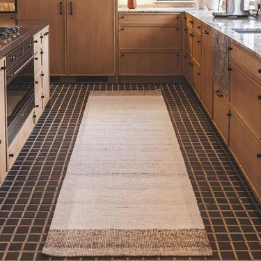 Atrium 100% recycled PET polyester outdoor runner rug in kitchen.