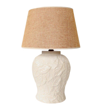 Large ceramic table lamp with glossy off-white leaf-textured base and soft beige shade