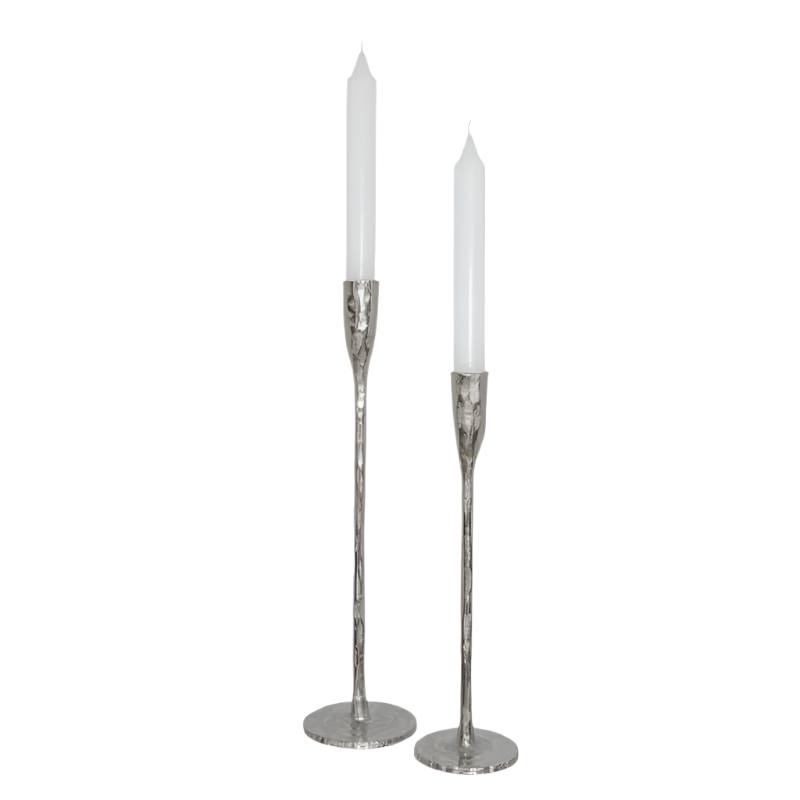 Set of 2 silver metal candlesticks with high-shine finish, round stable bases, and slim profiles.