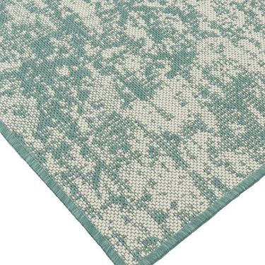 UV and stain-resistant jade rug perfect for indoor and outdoor decor.