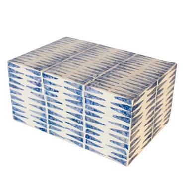 Detail of iridescent capiz shell surface in white and blue tones