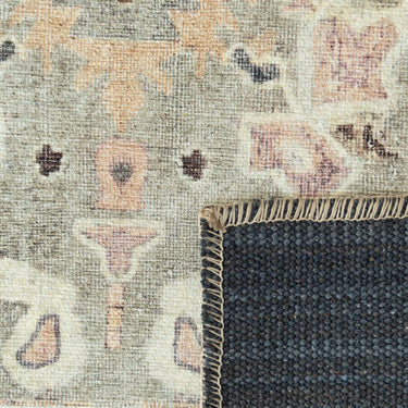 Baroness blush close-up of a patterned rug with a geometric design