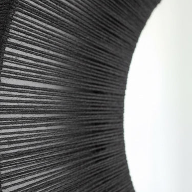 Handwoven black jute rope mirror sunburst detail