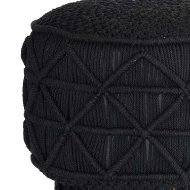 Close-up of handwoven black cotton macrame texture on footstool