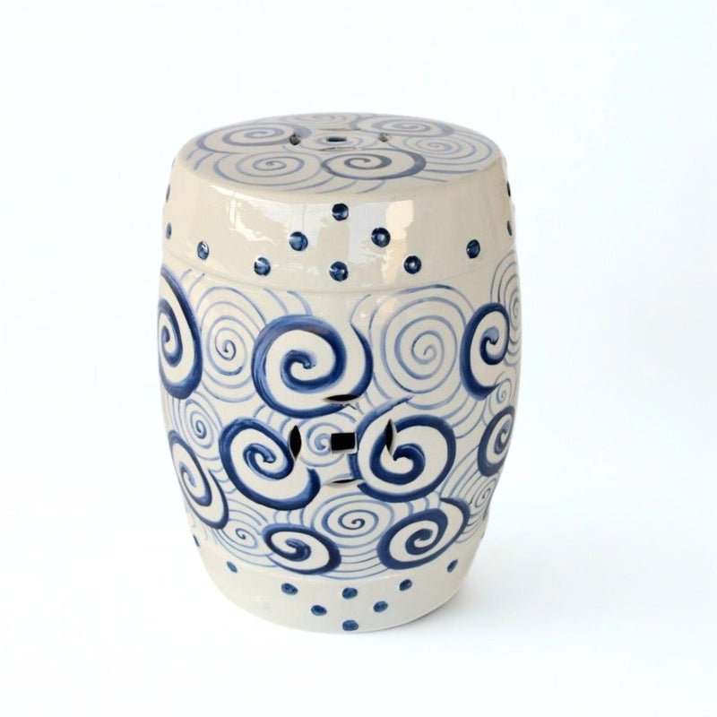 White decorative ceramic stool with blue circle design and central motif