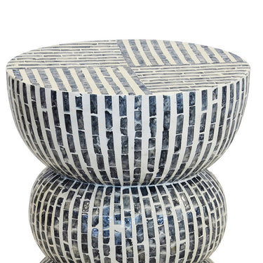 Elevate your space with the Rayé Accent Stool, a chic blend of modern design and organic textures.