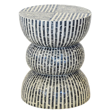 Rayé Accent Stool featuring black capiz stripes and a lightweight white frame, perfect for modern decor.