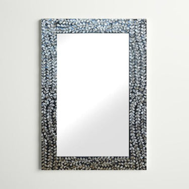Decorative rectangular wall mirror featuring capiz shells.