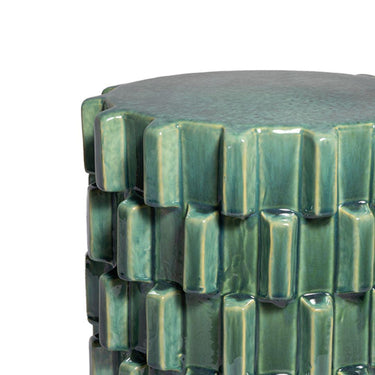 close up of the Handcrafted Celadon Ceramic Side Table with modern sculptural silhouette for indoor and outdoor use