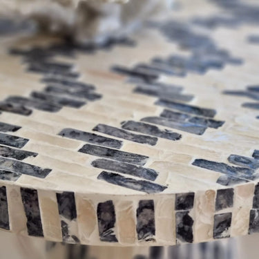 Close up of Capiz shell  Side Table handcrafted with care in a black and white finish