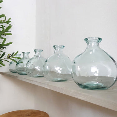 Mini Glass Vases on Wooden Table
