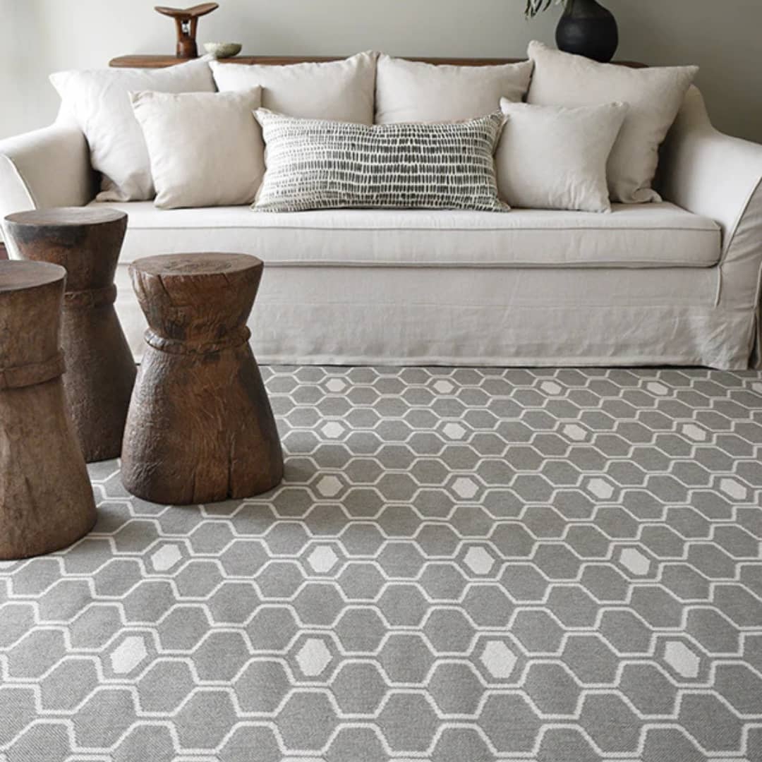 Pewter-toned Connection Reversible Rug with a bold design in living Room