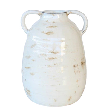 Cream ceramic vase with two handles, perfect for displaying flowers or as a decorative accent.