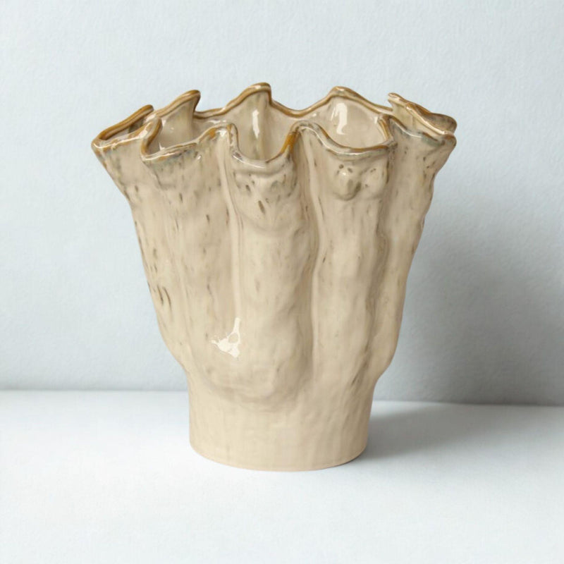 Cream Fluted Ceramic Vase features an elegant fluted silhouette that gently widens toward the top