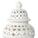 Close up of the white ginger jar with a cut out design