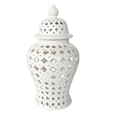 white ginger jar, crafted from ceramic with a cut out design