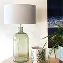 Recycled glass base lamp in organic slender shape