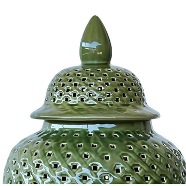  pierced detailing with a flared base and pointed lid.