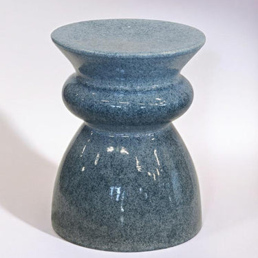 Ceramic decorative stool in blue, ideal for modern home décor.