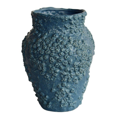 Deep ocean-blue ceramic vase with bold character