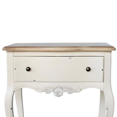 Vintage wooden bedside table with distressed finish.