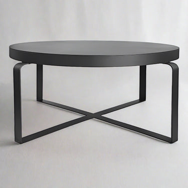 Modern metal coffee table and round side tables by Woodka Interiors.