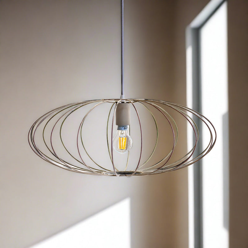 Eclipse wire pendant light hanging in living room