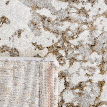 Elite rug in golden glow with plush texture and rich colour.