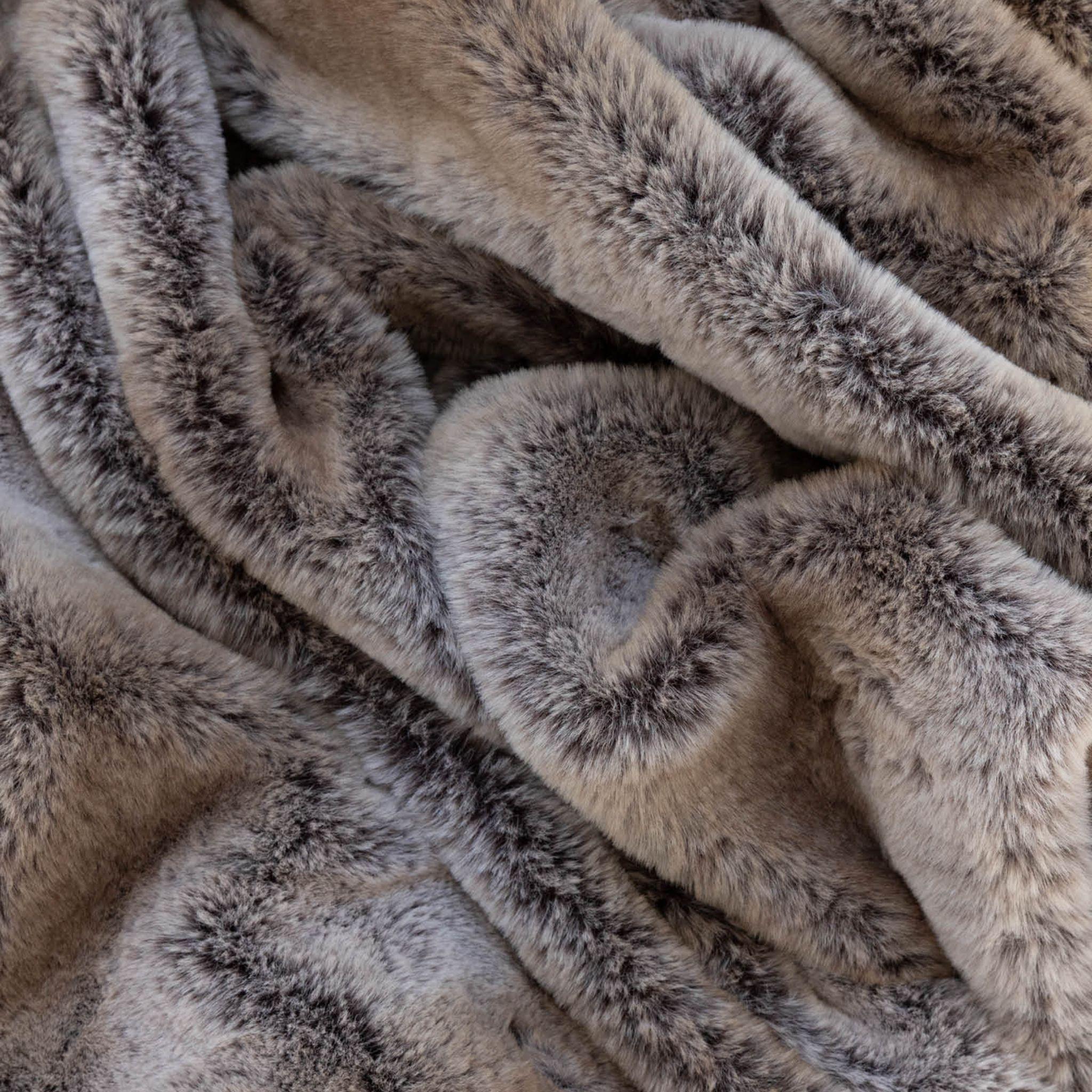 Elk faux fur textured, with a dark brown palette.