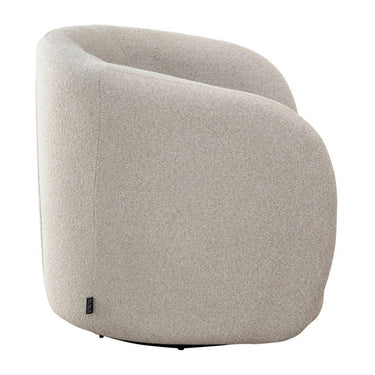 Neutral-tone swivel armchair covered in Hertex Comet Oats fabric