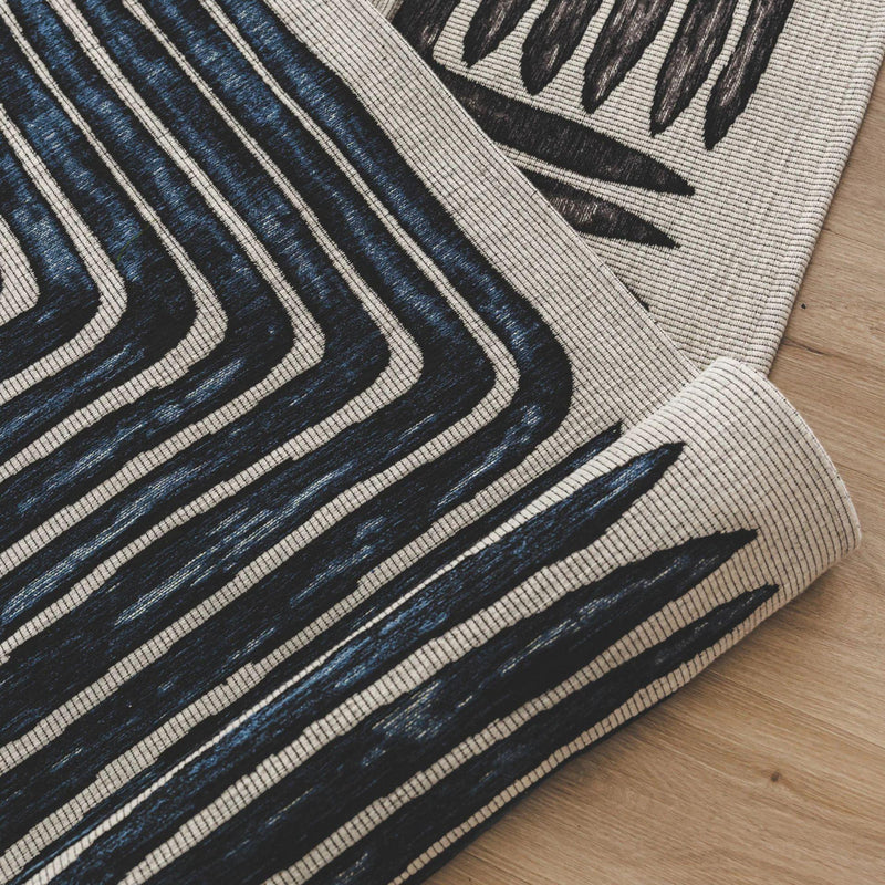 Wool-blend rug in blue-toned Ensign finish for subtle impact.