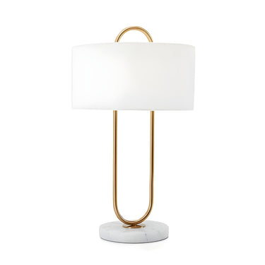  slim, gold oval shape makes a minimalist yet luxe statement for the marble base on the Faye table lamp.