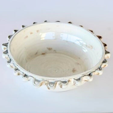  Frill Ceramic Centerpiece Bowl to enhance your kitchen or dining space with timeless elegance.