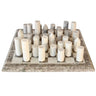 Gambit modern marble chess board game set with minimalist cylindrical stone pieces from Woodka Interiors