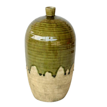 Large green dipped vase with glossy green glaze and organic drip effect