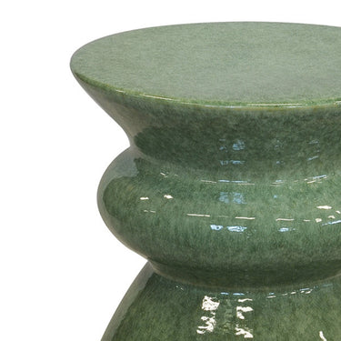 Stuning Round top green furniture stool used as a side table