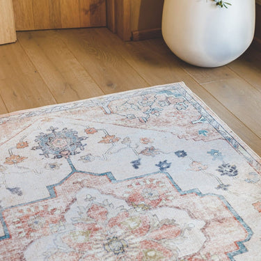 Juno Area Rug in Rosewater Woodka Interiors