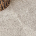 Close-up of Jupiter beige rug light neutral colours and overlapping curved blocks design.